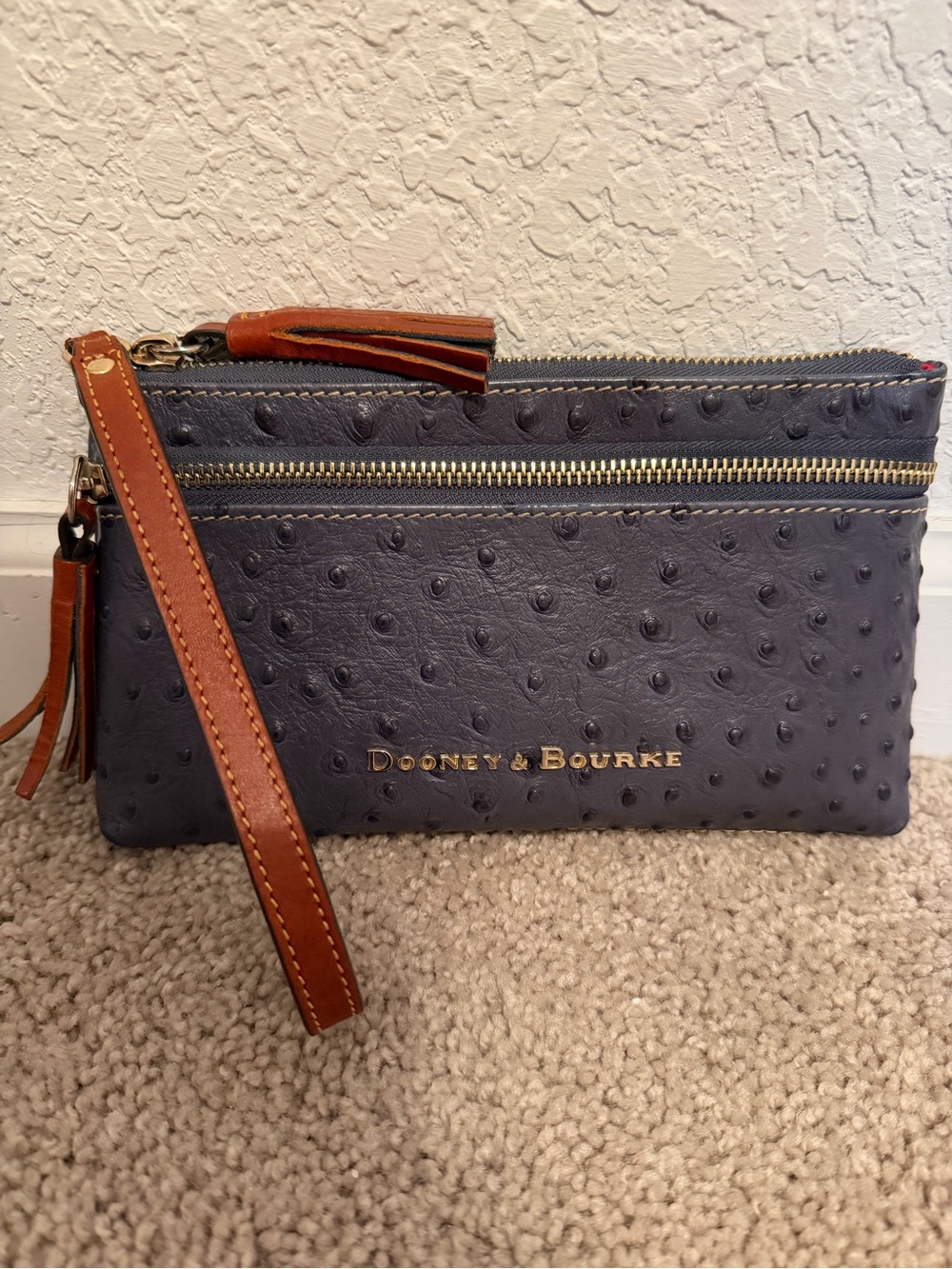 Dooney & Bourke Navy Ostrich-Texture Leather Wristlet with Brown Strap
